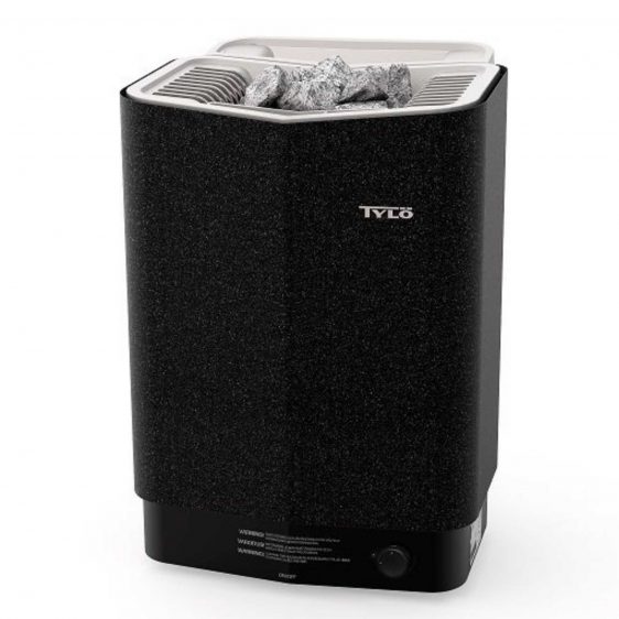 Un sauna Poêle Tylö Sense Combi Elite noir avec un dessus blanc, avec des pierres de sauna grises placées à l'intérieur. Le design compact et élégant comprend des évents pour la circulation de l'air et le rayonnement thermique. Le bas du radiateur est doté d'un bouton de commande pour les réglages de température.
